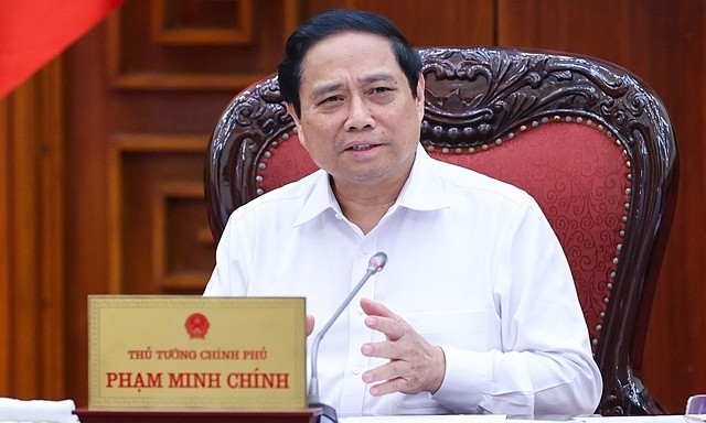 Thủ tướng Phạm Minh Chính chủ trì cuộc họp tháo gỡ khó khăn, vướng mắc, thúc đẩy phát triển nhà ở xã hội chiều tối ngày 17/5 - Ảnh: VGP