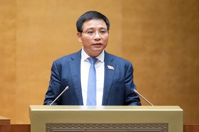 Bộ trưởng Bộ Tài chính Nguyễn Văn Thắng trình bày báo cáo quyết toán ngân sách nhà nước năm 2023. Ảnh: Quochoi.vn