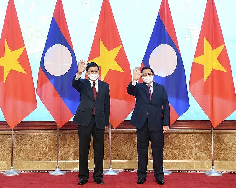 Thủ tướng Chính phủ Phạm Minh Chính và Tổng Bí thư, Chủ tịch nước Cộng hòa dân chủ nhân dân Lào Thongloun Sisoulith - Ảnh: VGP